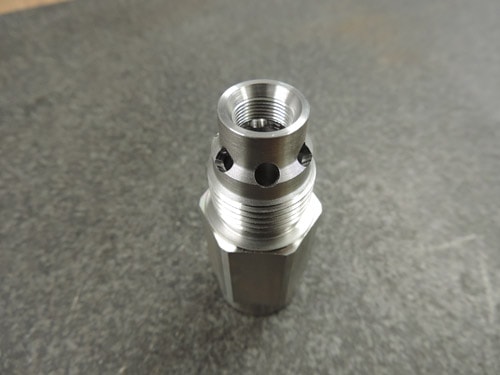 Thermal Deburring of Adapter for the Fluid Power Industry